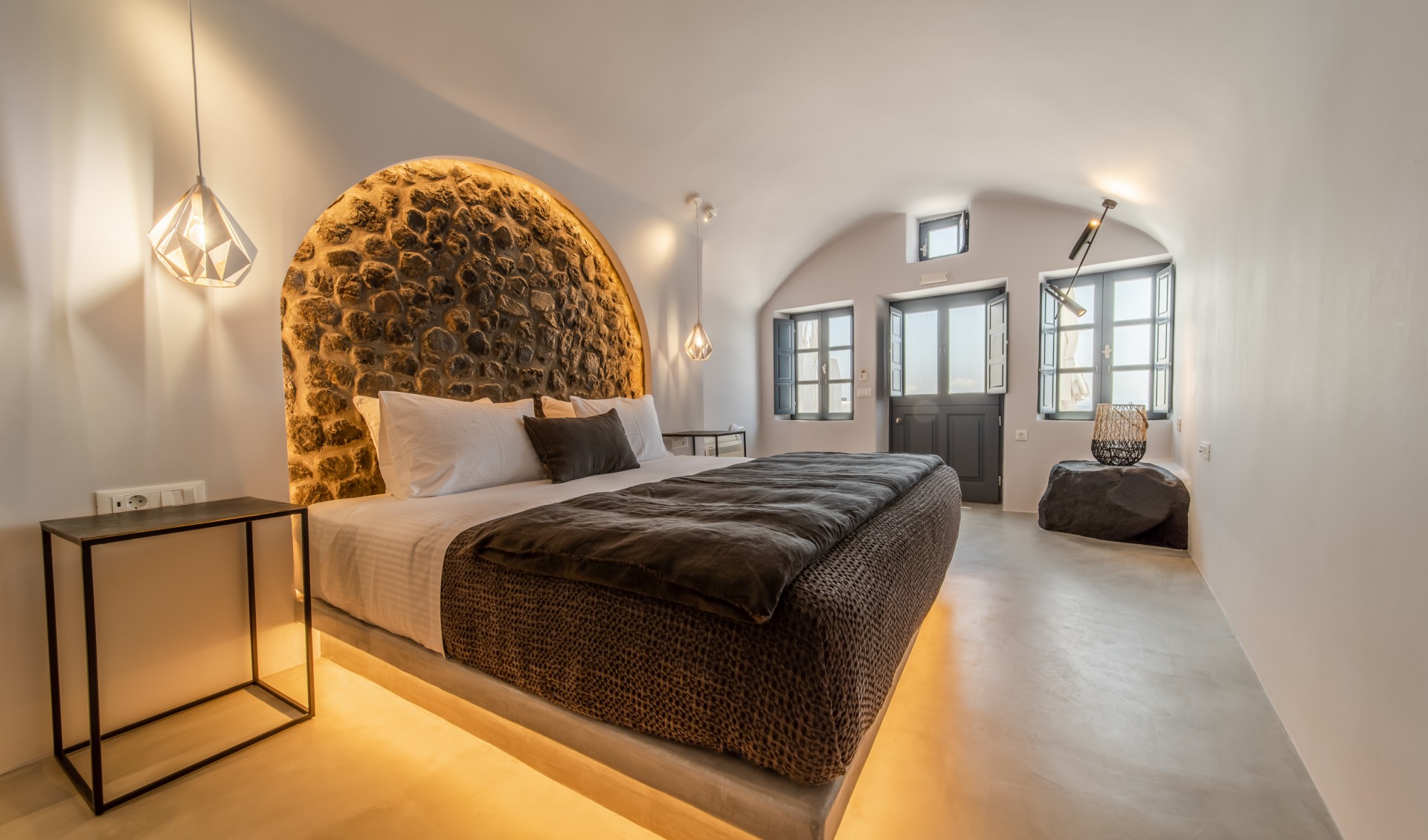 The interior of the luxury studio of Nostos Apartments in Oia Santorini