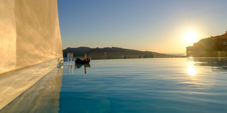 nostos-pool-sea-sunset-view