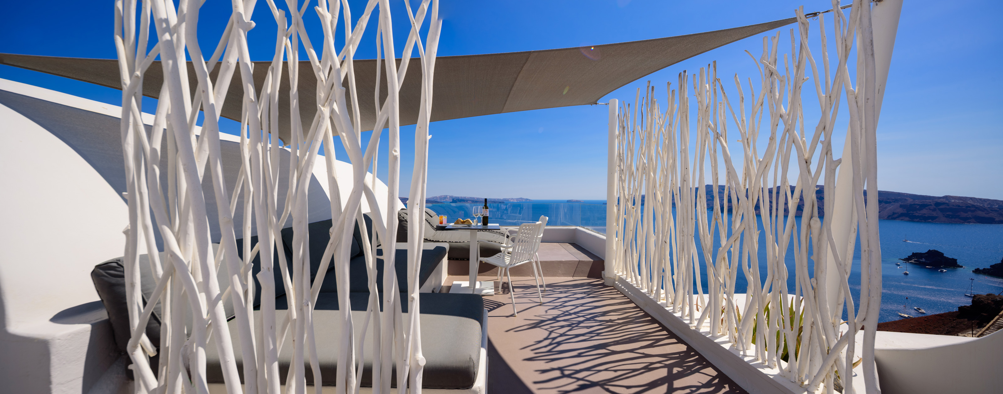 NostosOiaSantorini2025_SignatureCaveSuite_10_Booking